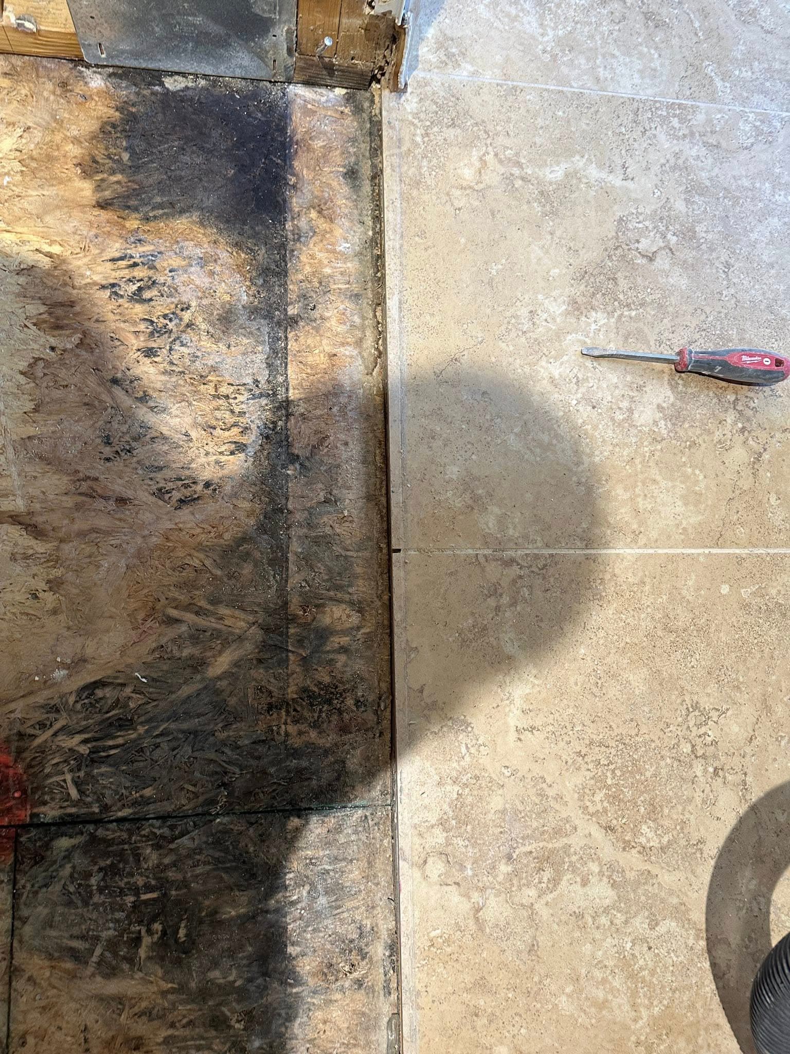 Travertine bathroom floor in progress